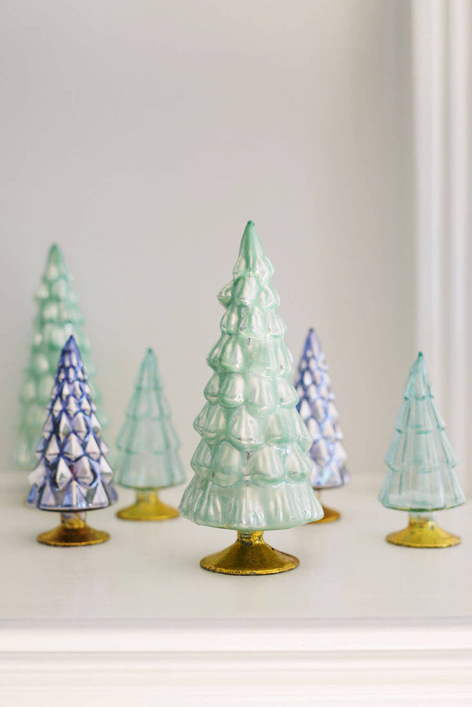 https://cdn.shopify.com/s/files/1/0577/0588/9924/products/cody-foster-blue-green-glass-christmas-trees_1024x1024.jpg?v=1666821673