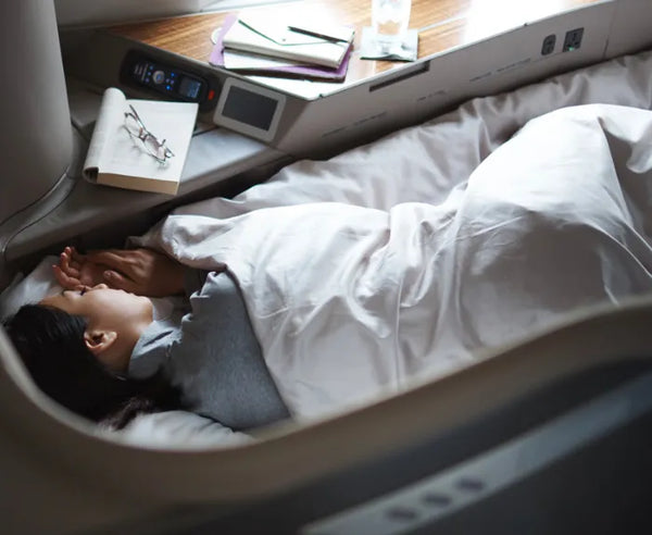 Woman Sleeping in Cathay First Class