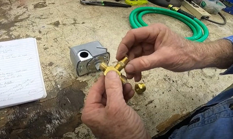 Attaching tee connector to pressure switch