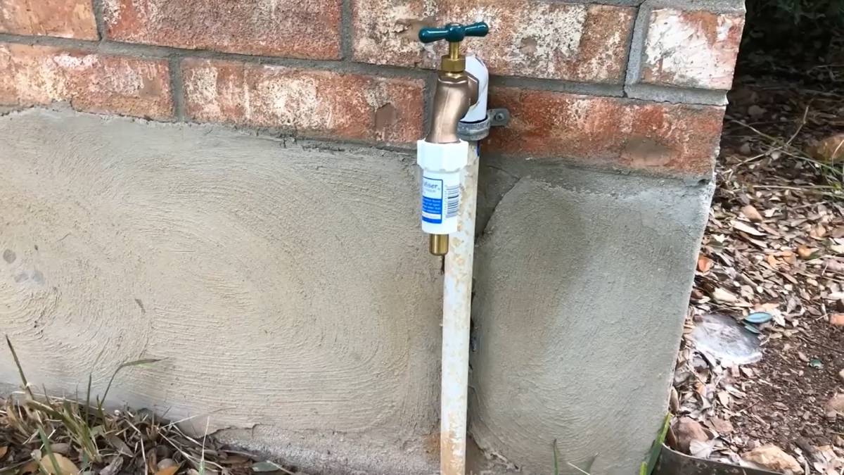 A Freeze Miser installed on an outdoor faucet.