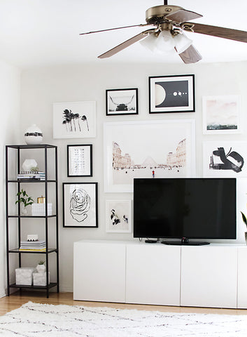 gallery wall behind modern tv stand white trendy aesthetic artsy