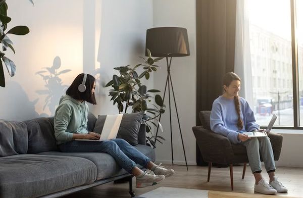 Living Room with People on Devices