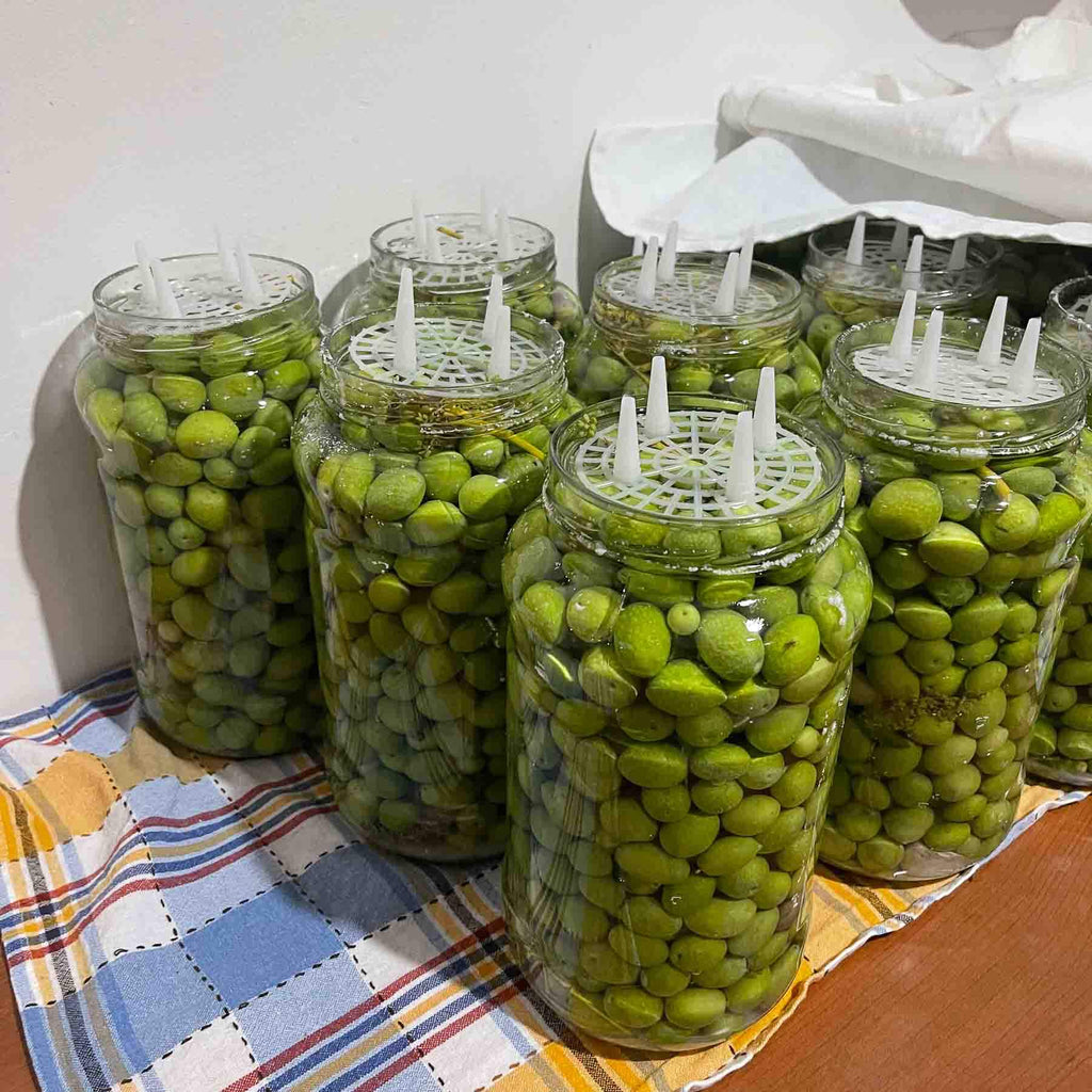 jars of brined green olives