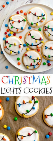 Sugar Cookies with white icing and black lines with colours to represent Christmas lights - Giddy Vibes