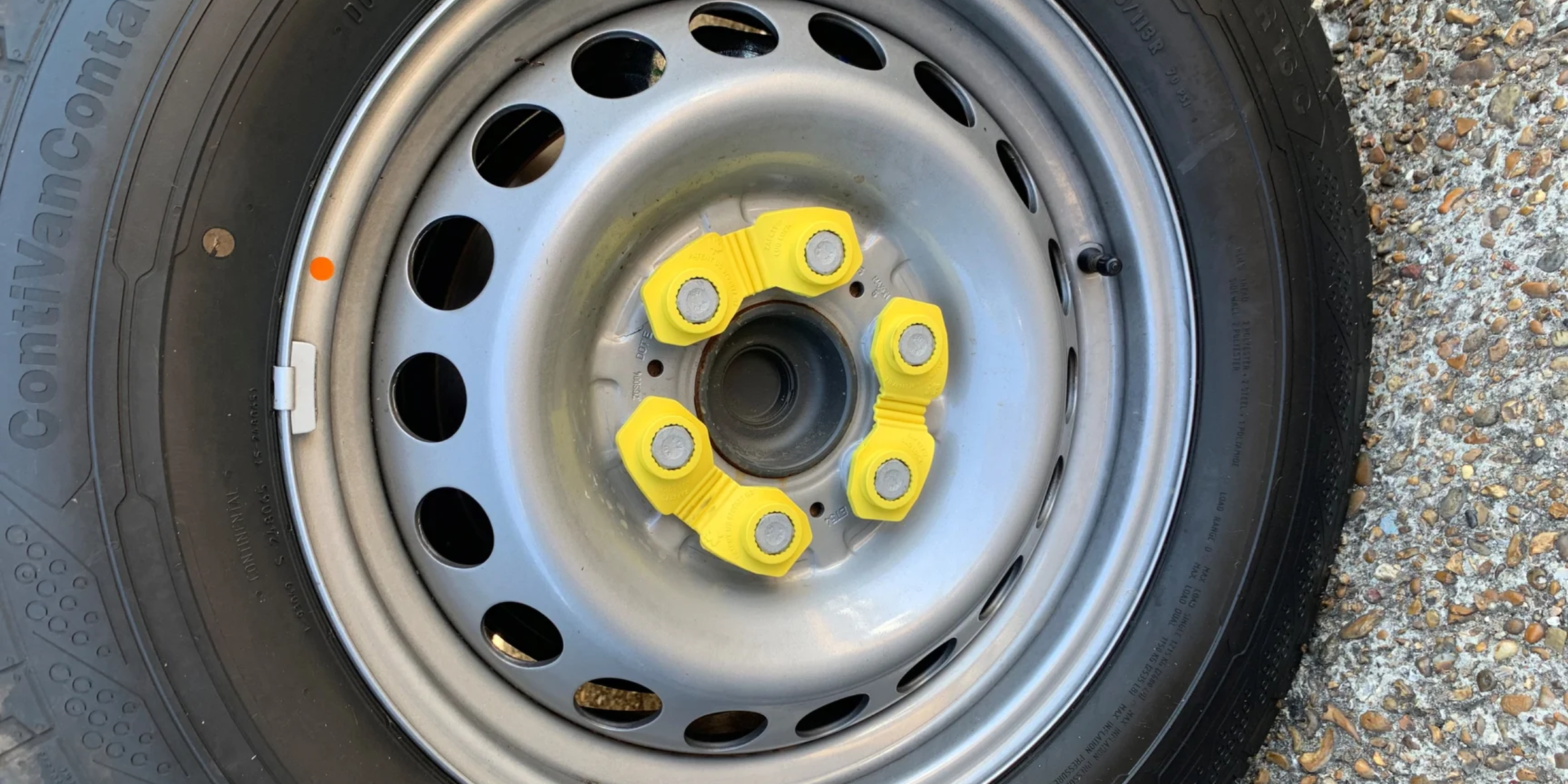 HGV wheel with Zafety Lug Locks attached