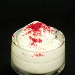 White Chocolate Vanilla Ice Cream, Served with Powdered Raspberry