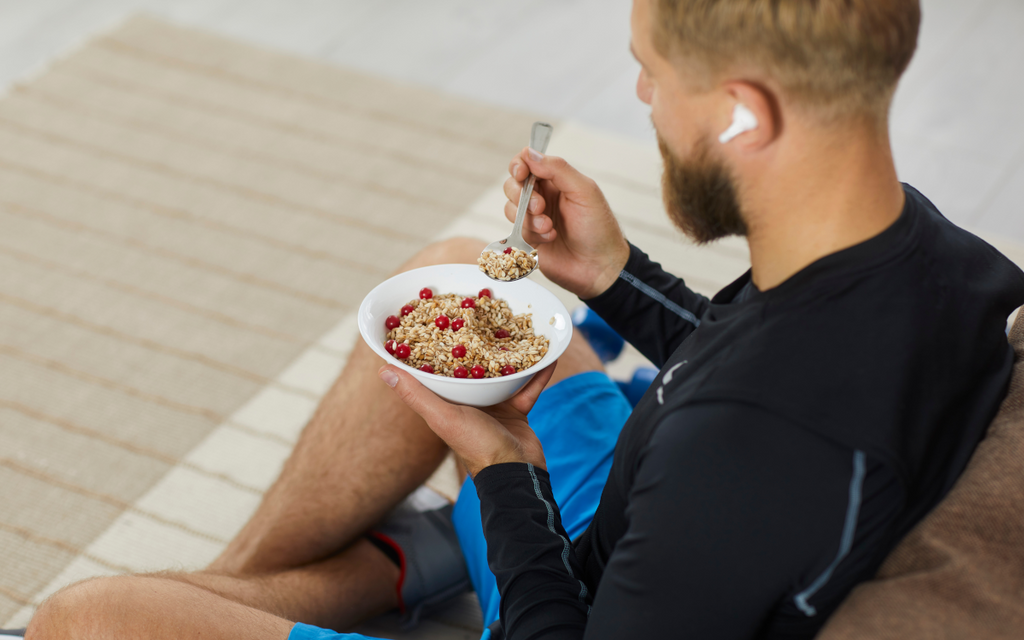 Athlete eating after intermittent fasting