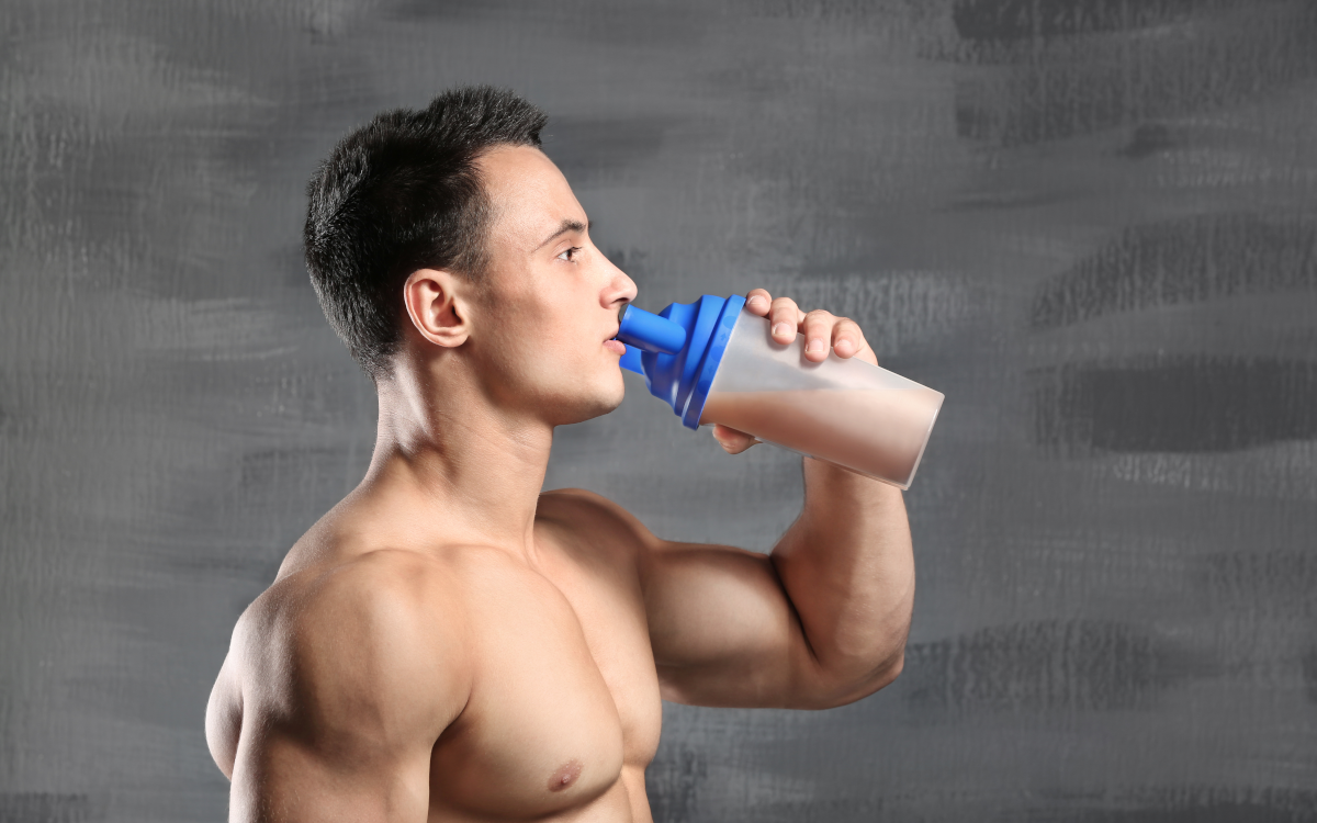 man drinking mass gainer