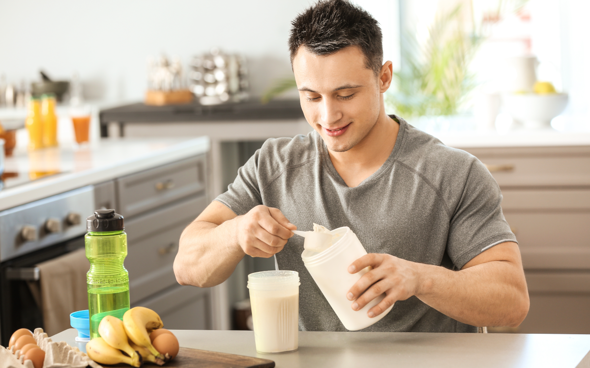 Man making protein shake