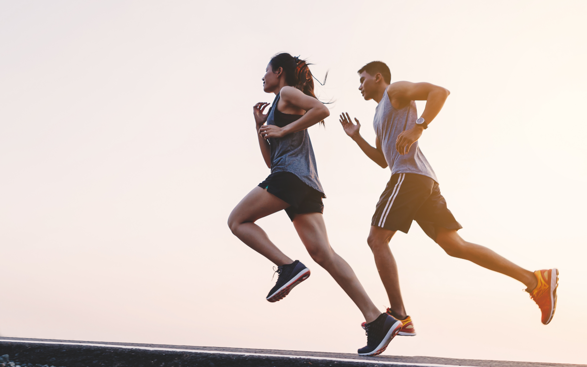 Man and woman running a marathon