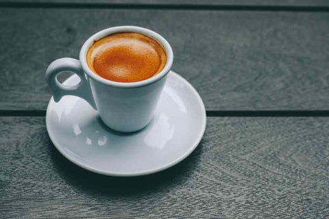 Espresso roast coffee in a cup