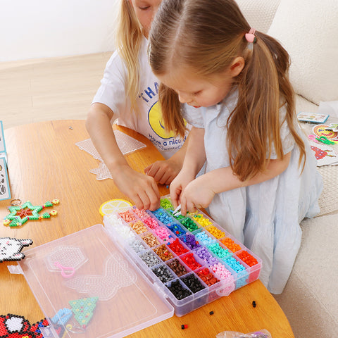 Girls playing with fuse beads