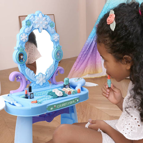 Girl playing with vanity set 