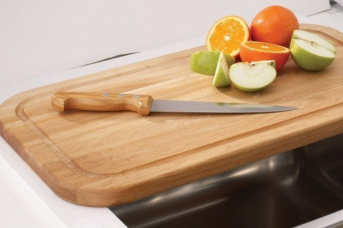 Cutting Fruit on Wooden Cutting Board