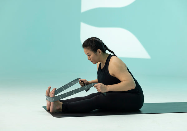 Yoga – Straps and Stretching – Evoke Wellness
