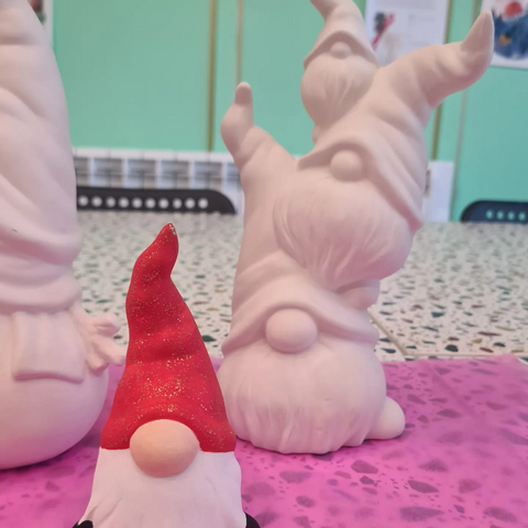 Image shows gnome ornaments available for painting and decoupage at the Art Attack Angus studio