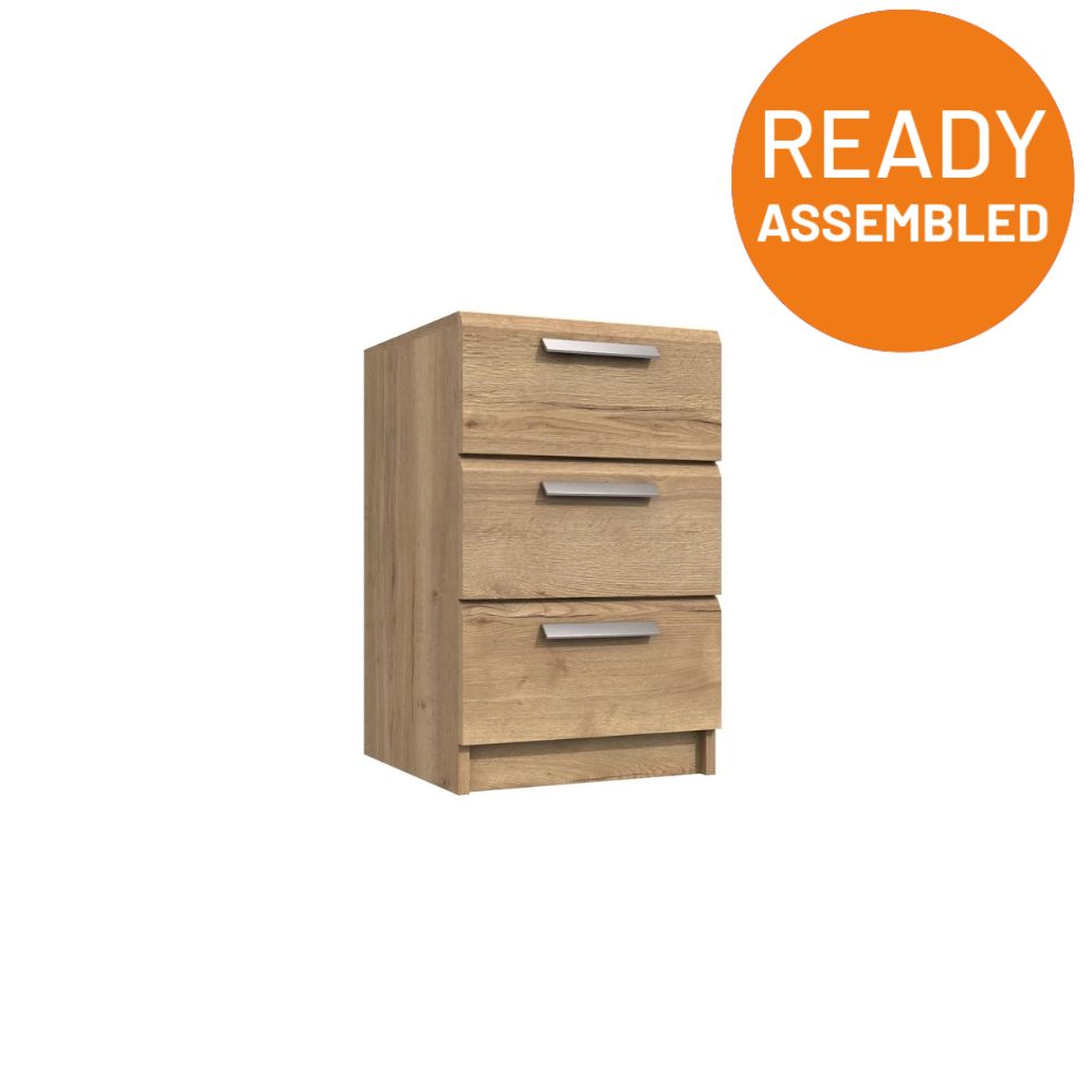 Buckingham Ready Assembled Bedside Table with 3 Drawers - Natural Rustic Oak - Lewis’s Home  | TJ Hughes