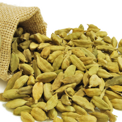 green cardamom for digestion on white background