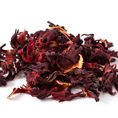 loose leaf hibiscus tea on a white background
