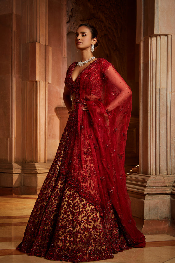 Kajal Aggarwal's red Anamika Khanna bridal lehenga featured stunning  Kashmiri resham work | VOGUE India