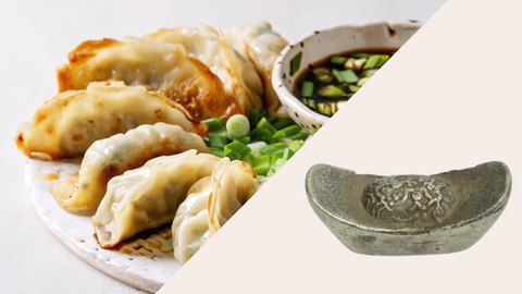 dumplings next to chinese silver ingot