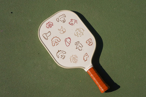 Pickleball Paddle with Dogs on It