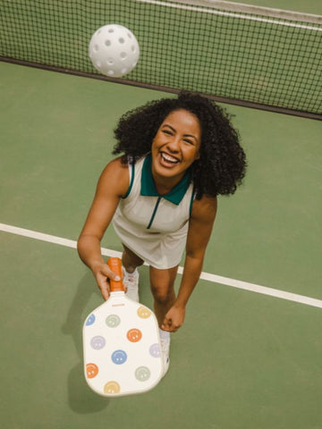 Girl playing pickleball