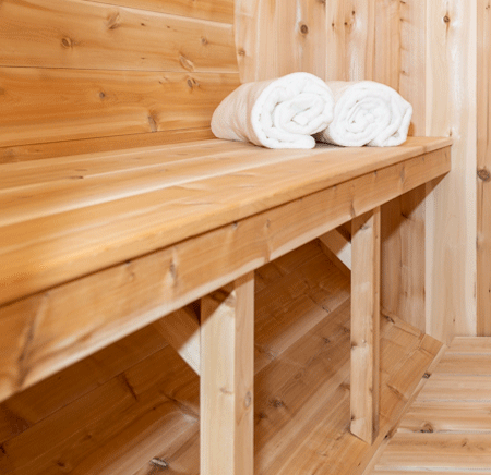Inside view of barrel sauna showing bench