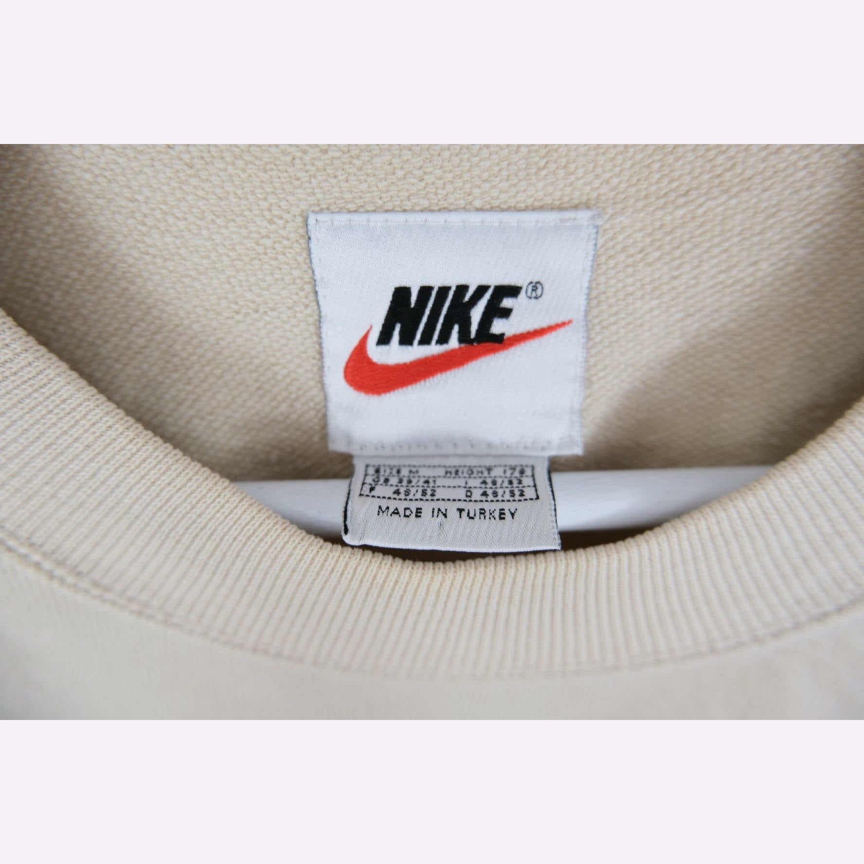 nude nike crewneck