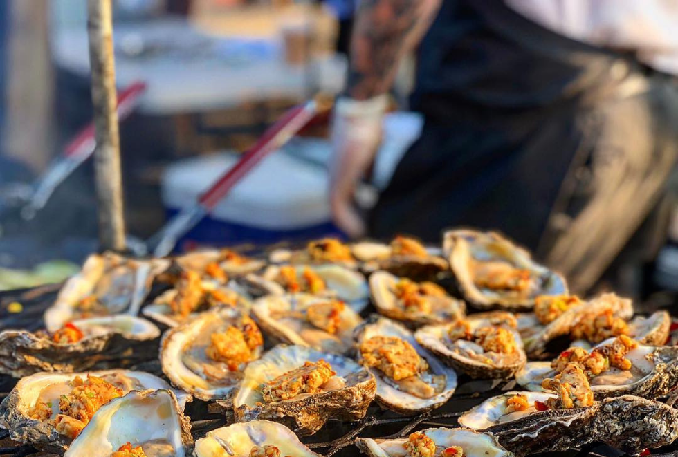 Oysters grilling on the KUDU open fire grill