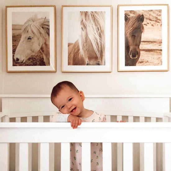 toddler standing in crib