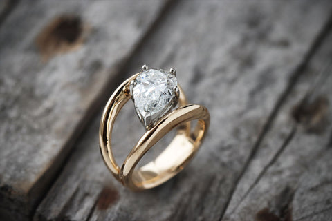 lab-grown pear shaped diamond on a comfit fit band