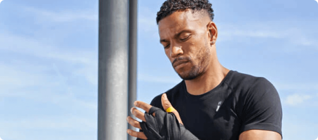 man exercising outdoors in the sun