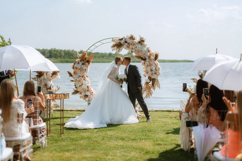 Summer-wedding-ceremony-flower-pillar-and-arch