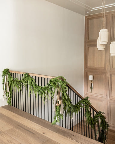 staircase with greenery