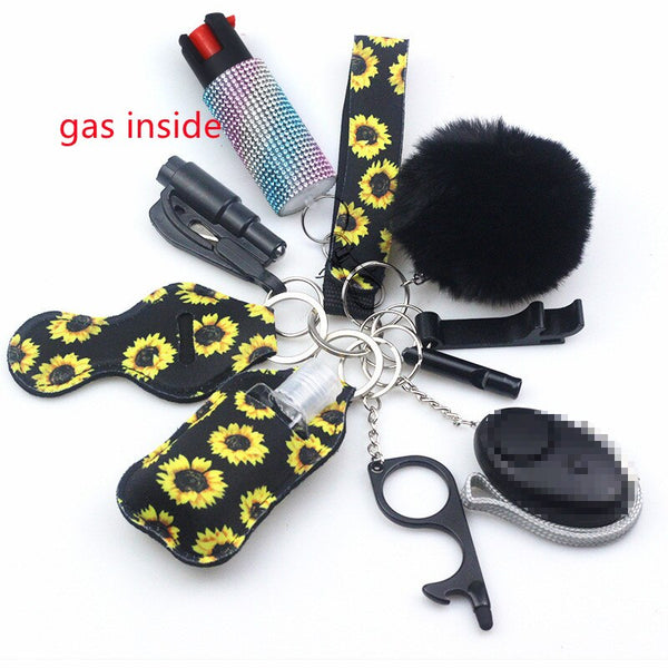 Self Defense Keychain Set Bundle with Pepper Spray, Alarm, Whistle, Window Breaker in a Black Sunflowers Pattern