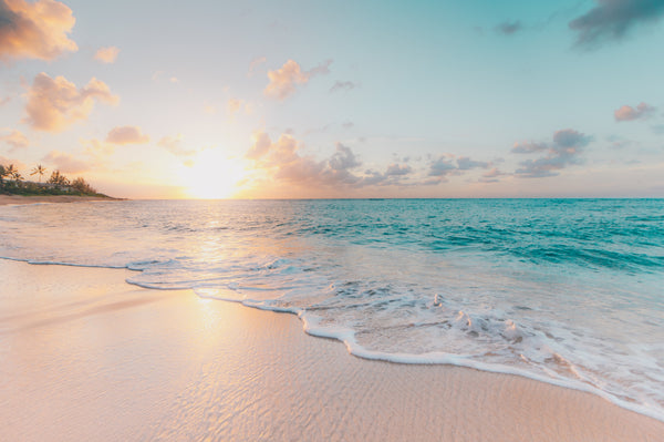 Beautiful Sunrise on Beach on Tropical Island with Wwater
