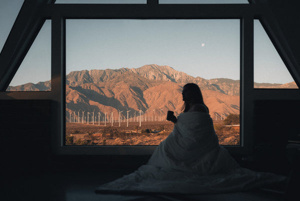 Woman Relaxing at Mountain-View Resort Vacation