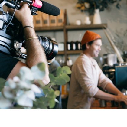 A barista shooting a how to video for their social media marketing channels