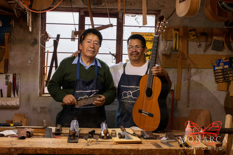 Guitar makers in guitar shop