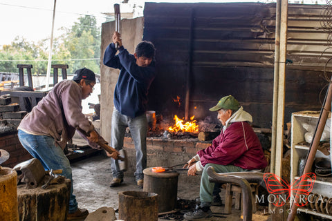 Artisans working copper in Mexico