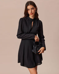 The Black Mock Neck Cutout Pleated Mini Dress