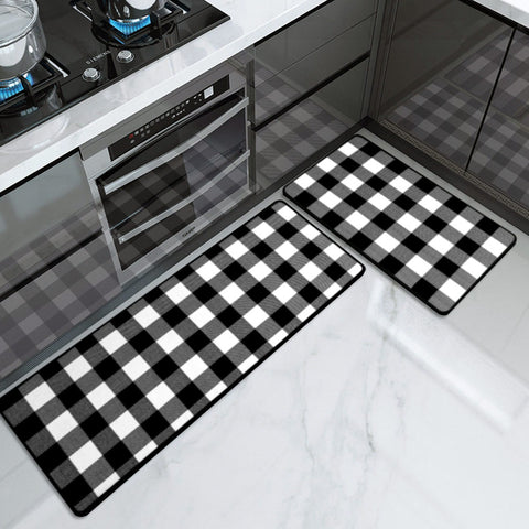 The black and white color of gingham kitchen rug is very classic