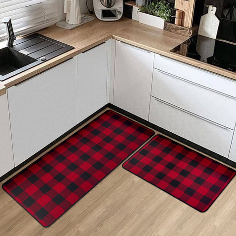 The red buffalo plaid kitchen rug makes the home feel festive