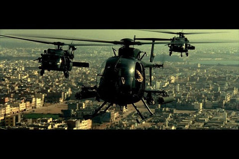 3 Small Special Operations Helicopters flying over Somalia as part of the movie BlackHawk Down