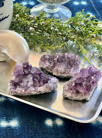 Amethyst Crystal Cluster displayed on a silver tray with Seashells and Porcelain