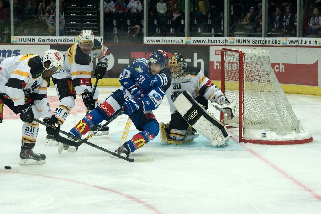 hockey players with safety gear