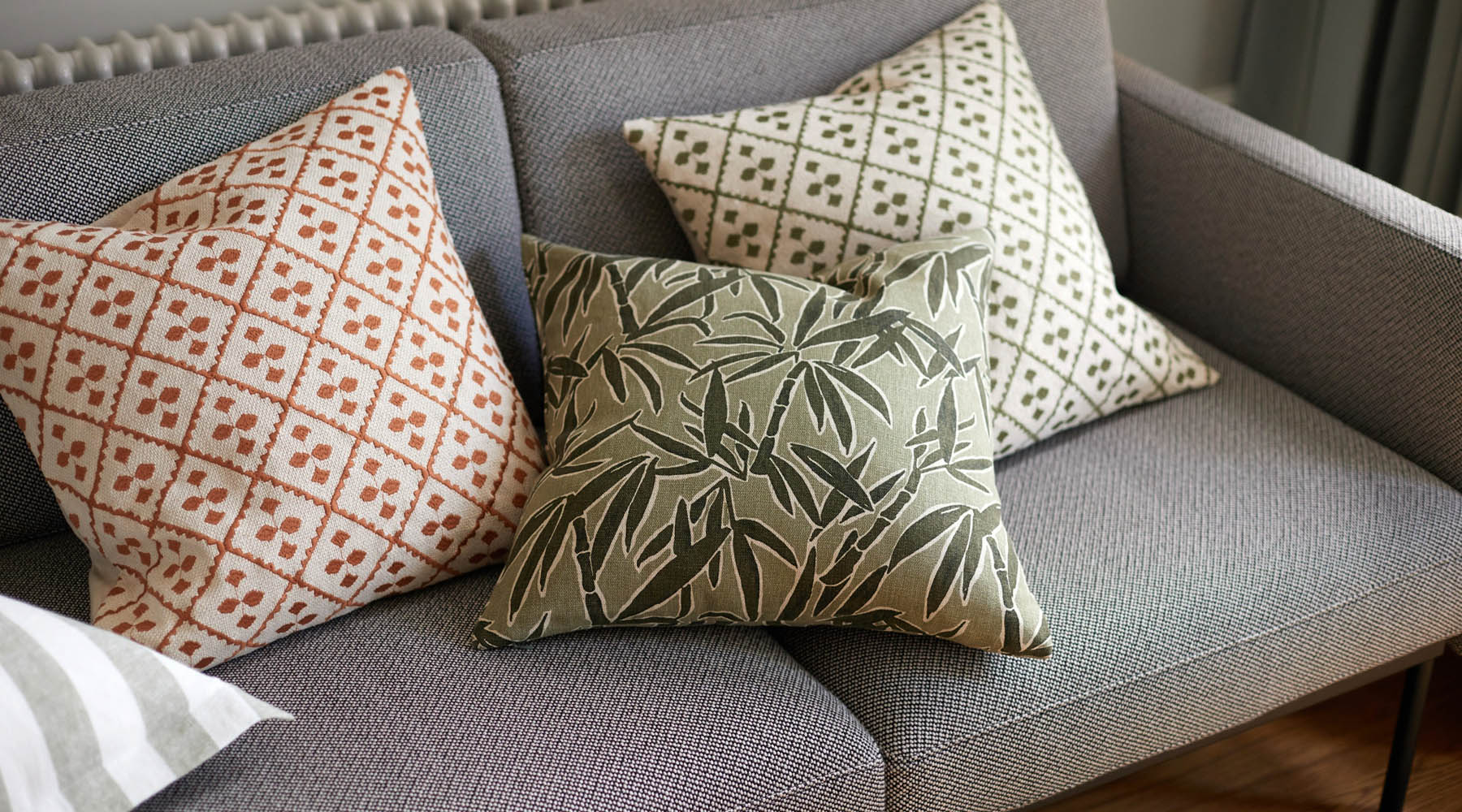 Guadeloupe Olive cushion in lounge