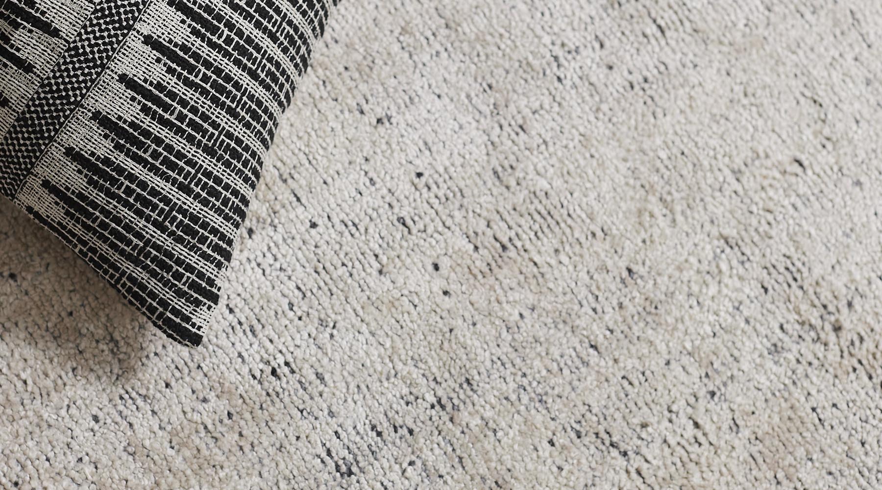 Weave Tatami Shadow cushion with Granito floor rug