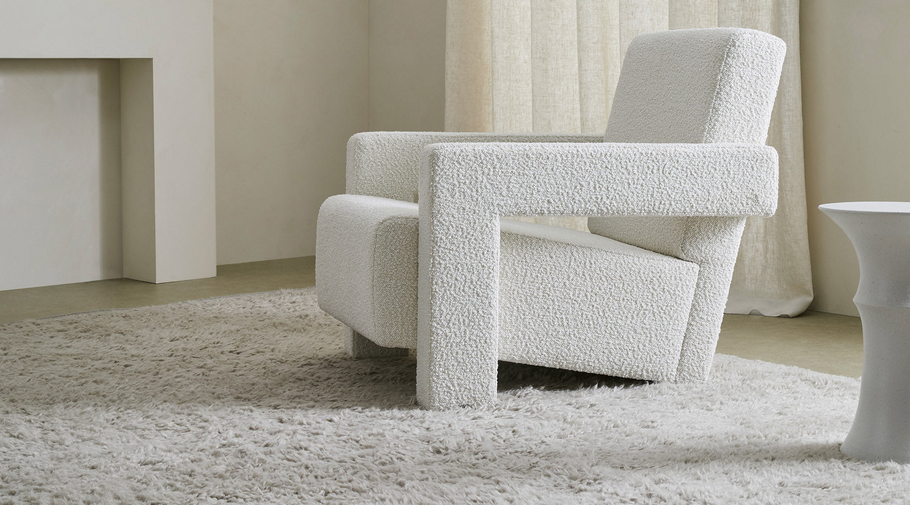 Boucle chair with Weave Greenwich Feather shag pile rug